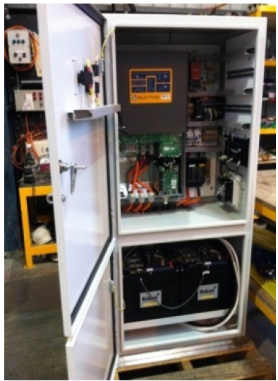 Internal view of Residential Energy Storage System (RESS). Inverter and controls in upper compartment. Batteries in lower compartment.